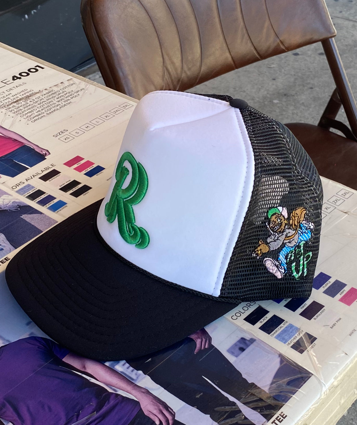 Two logo trucker Hat