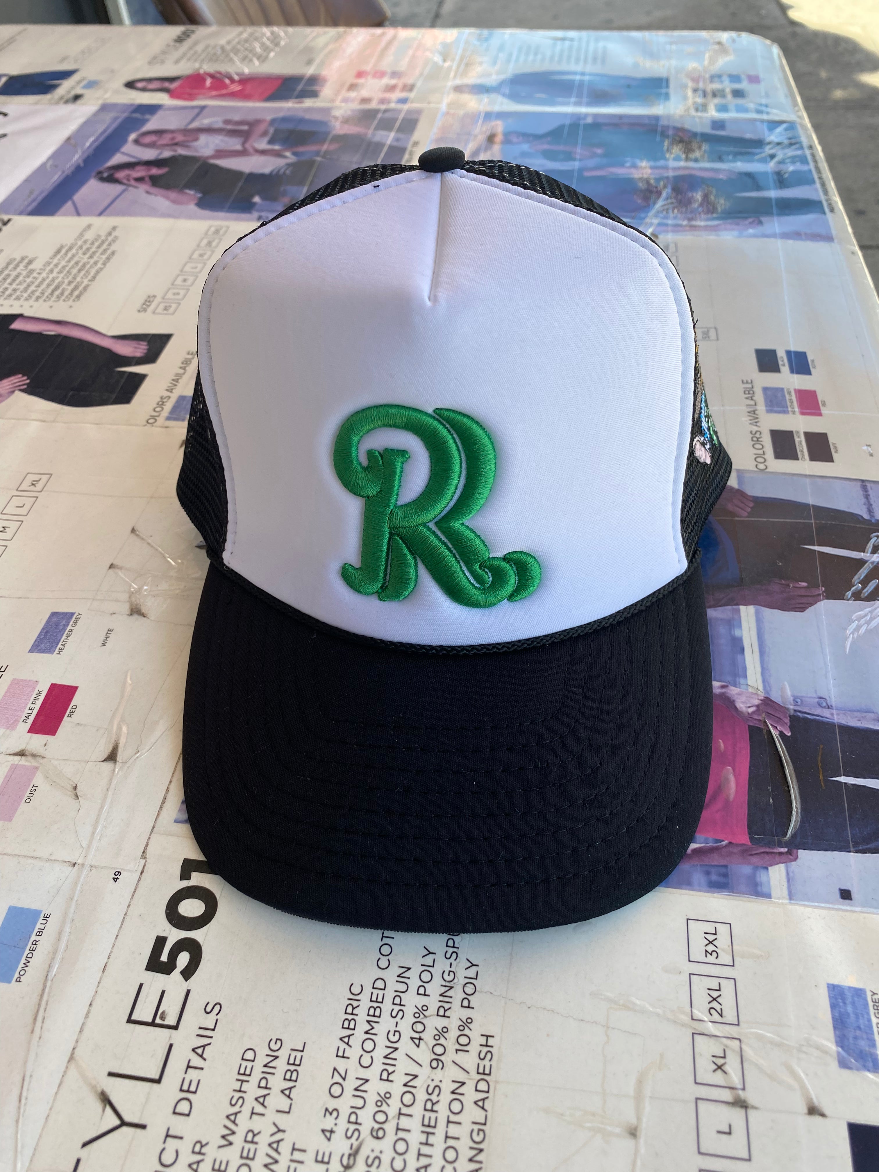 Two logo trucker Hat