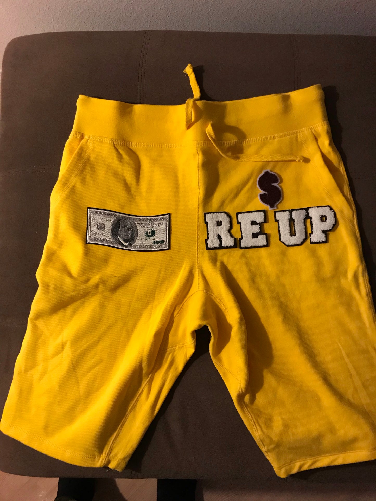Yellow custom Re’up shorts